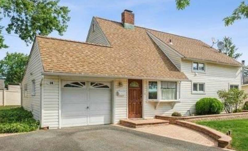 View of front facade with a garage