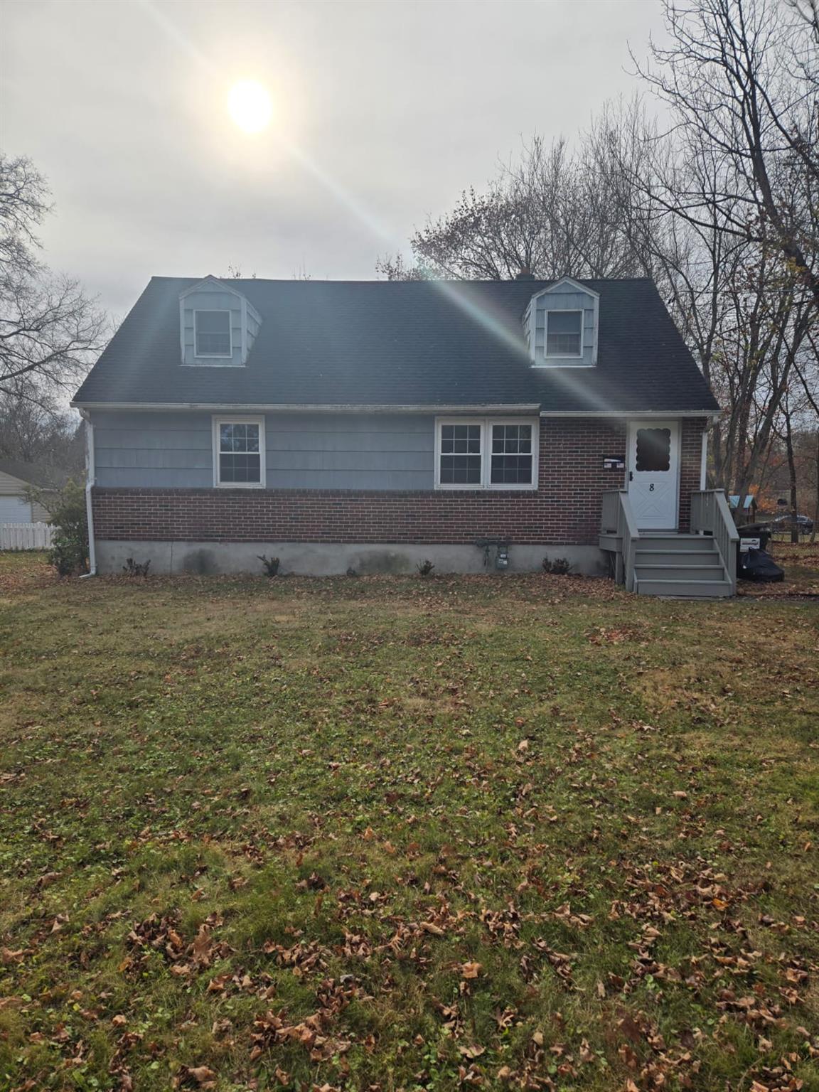 View of front of property with a front yard