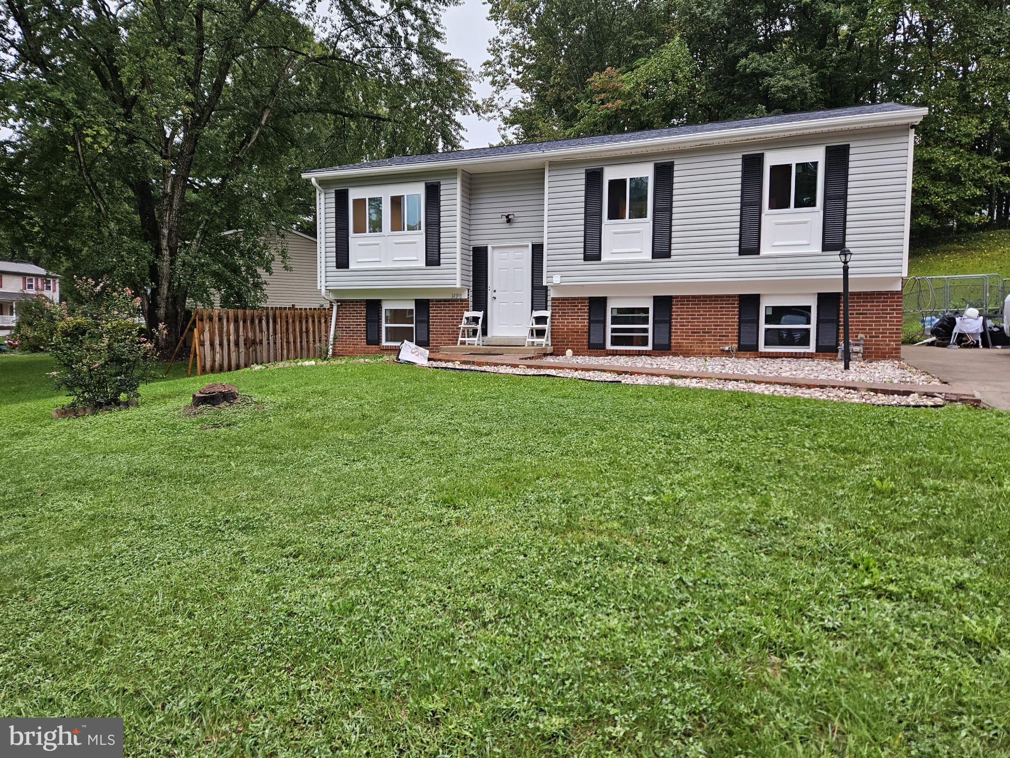 a house view with a garden space