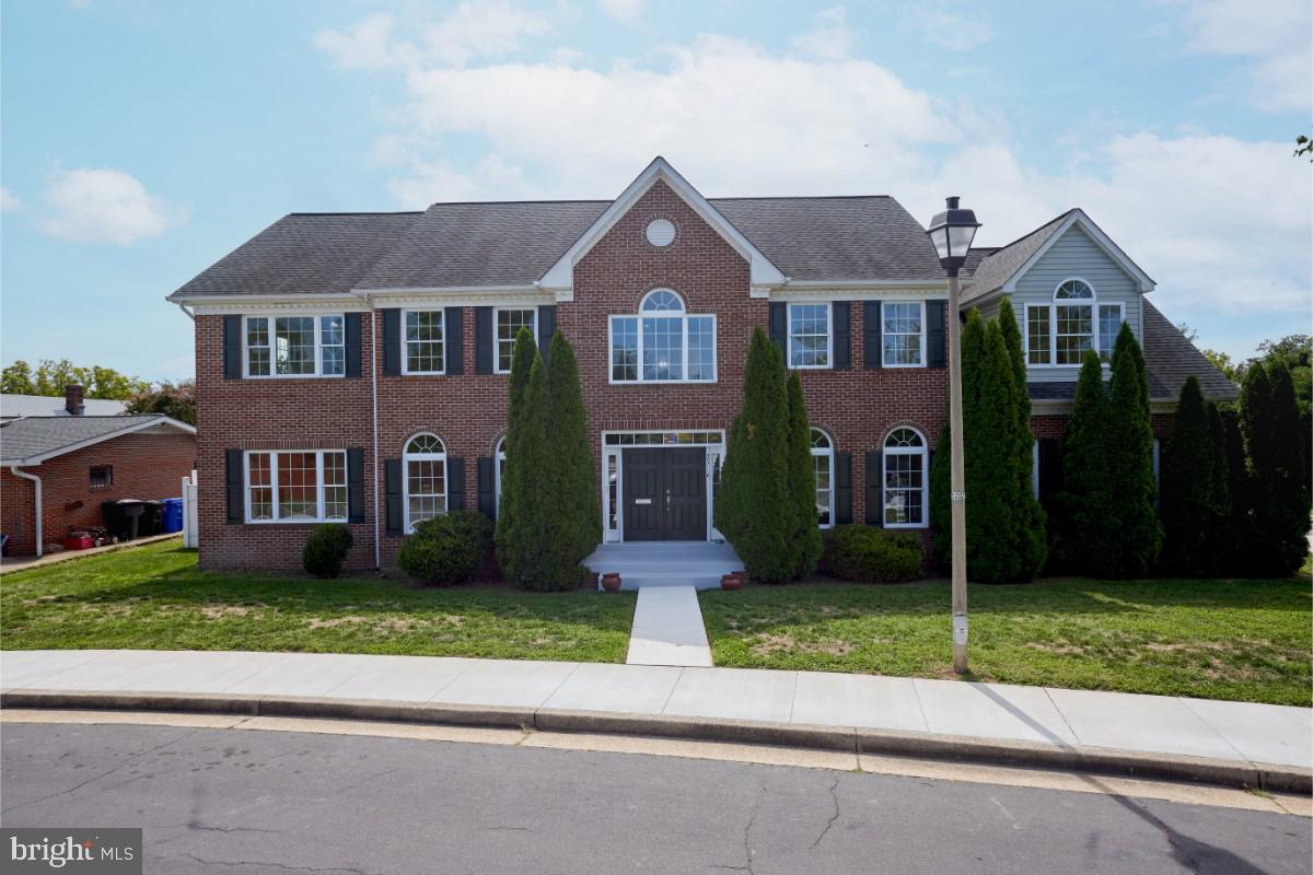 front view of house with a yard