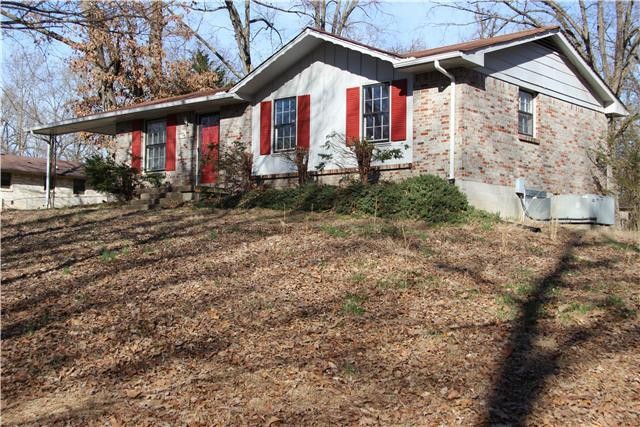 a front view of house with yard