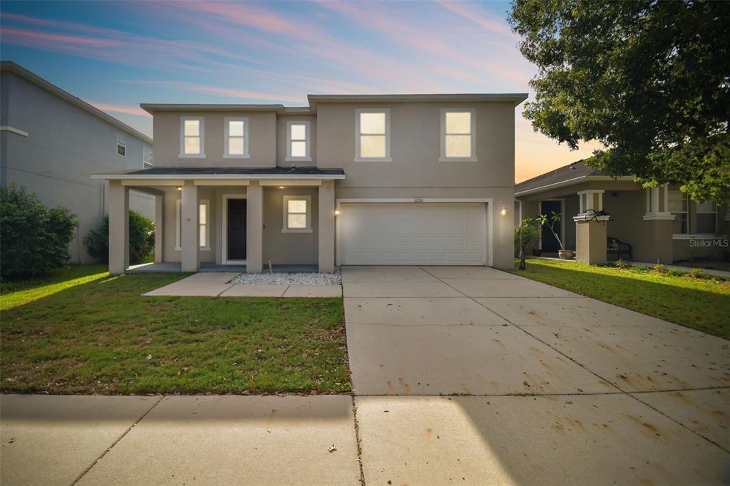 a front view of house with yard