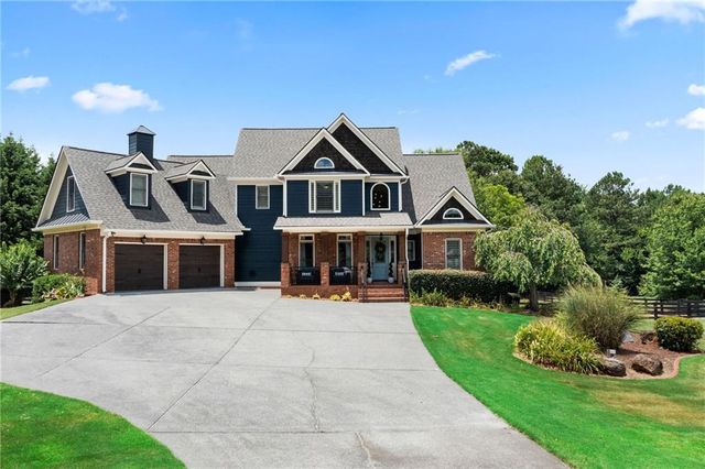 $950,000 | 14 Lake Point Drive Southeast