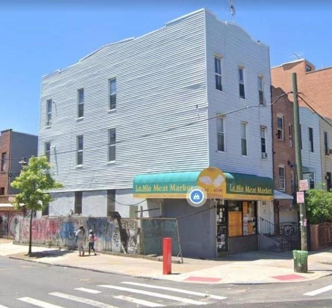 a front view of a building with street