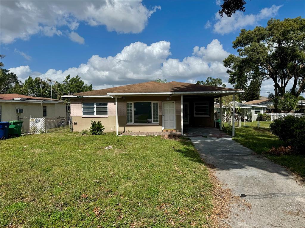 front view of a house with a yard