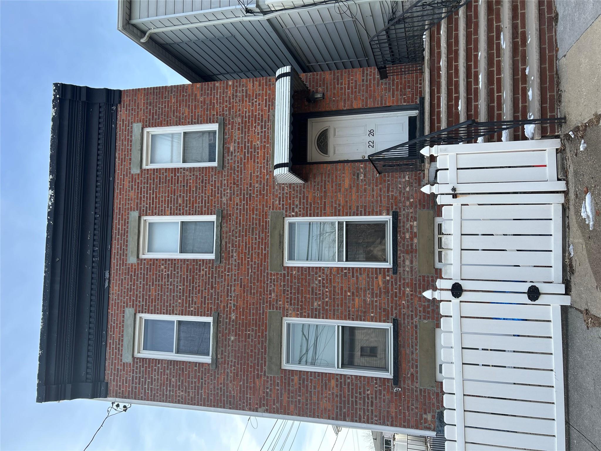 a building view with a brick wall