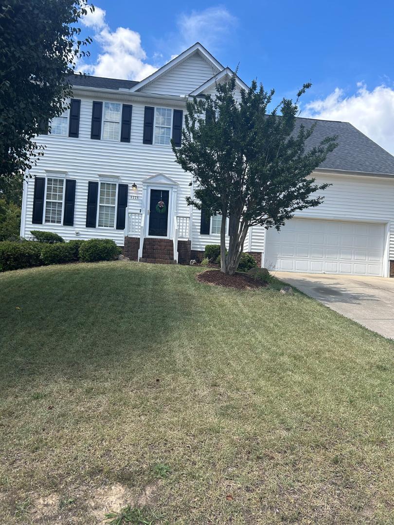 a view of house with outdoor space