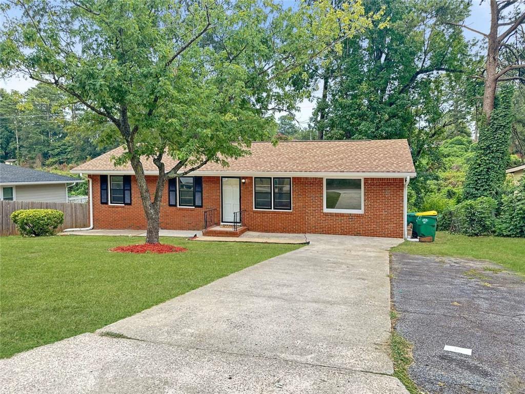 front view of a house and a yard