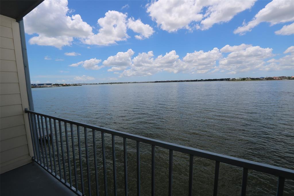 a view of a lake from a balcony