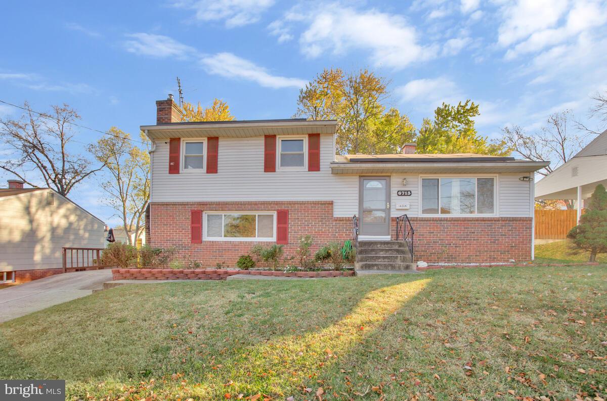 front view of house with a yard