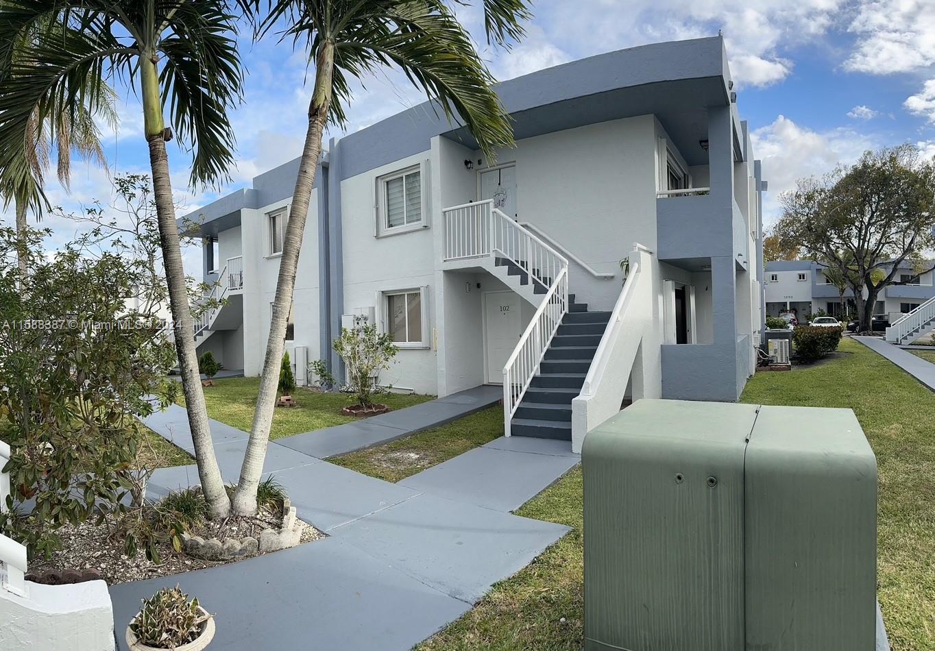 a front view of a house with entertaining space