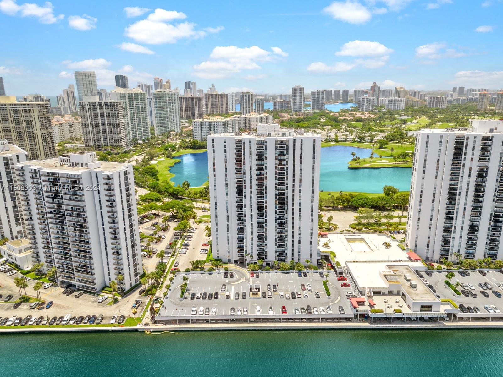 a view of a city with tall buildings