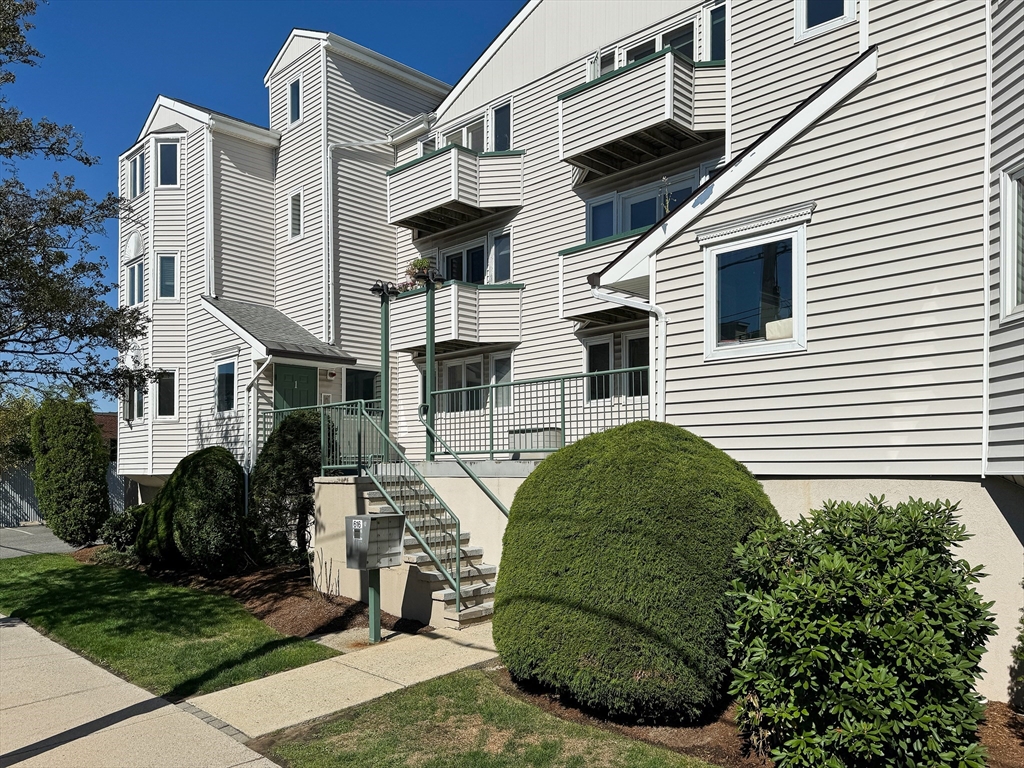 a view of a front of house with street