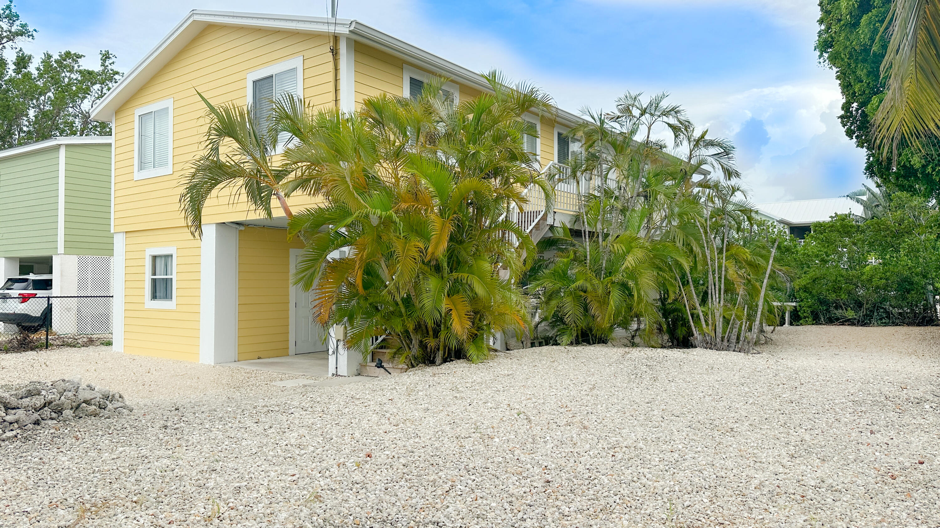 a view of a backyard of the house