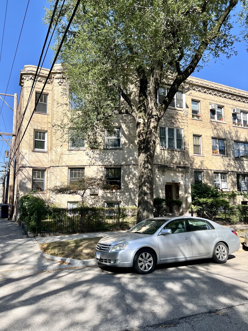 a car parked in front of a building