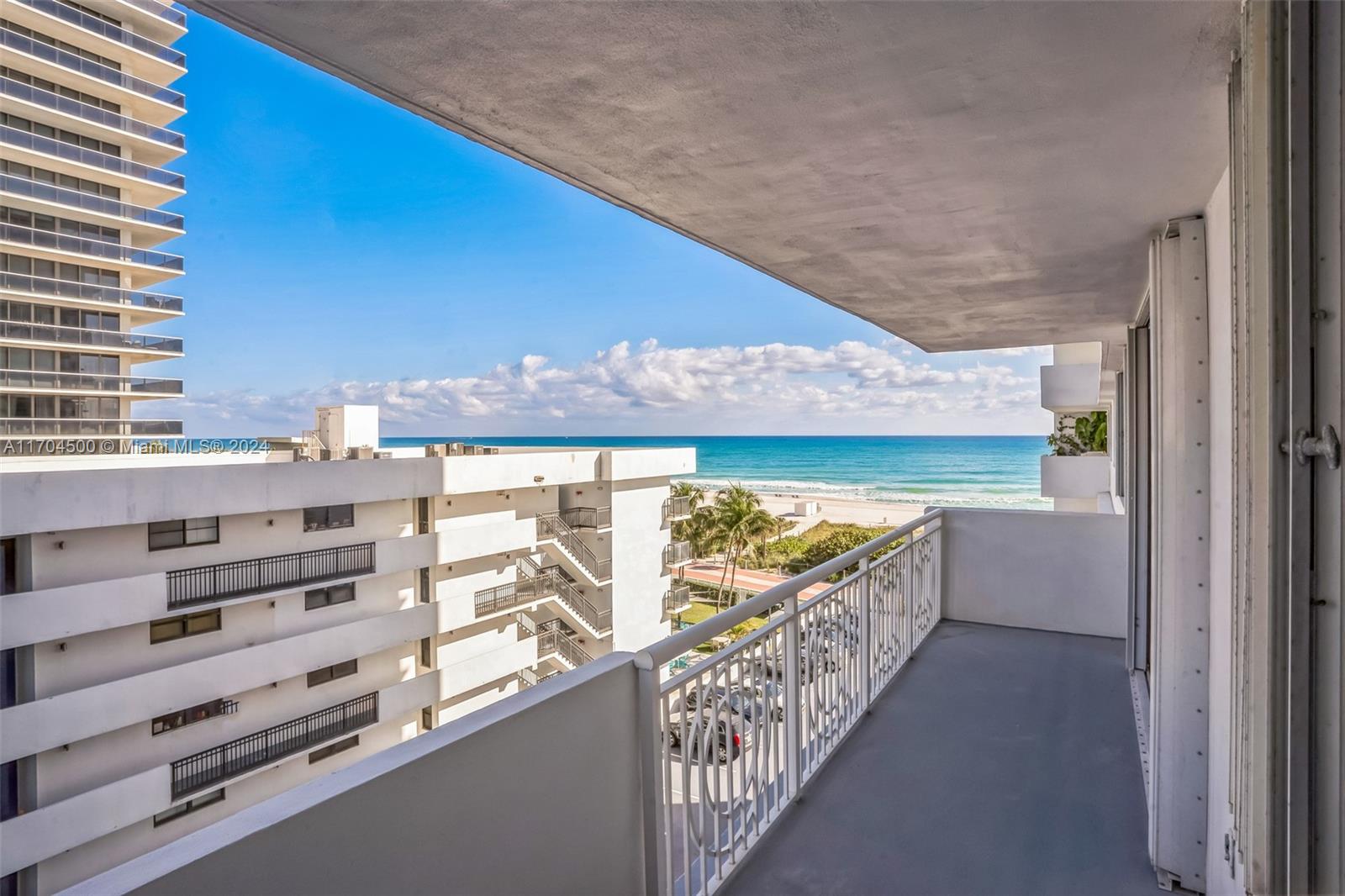 a view of a balcony with an outdoor space