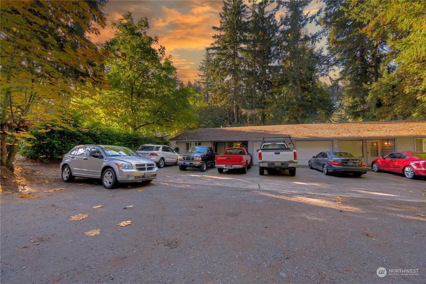 a view of a cars parked in a parking lot