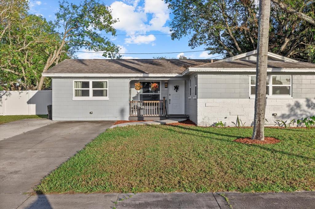 front view of a house with a yard