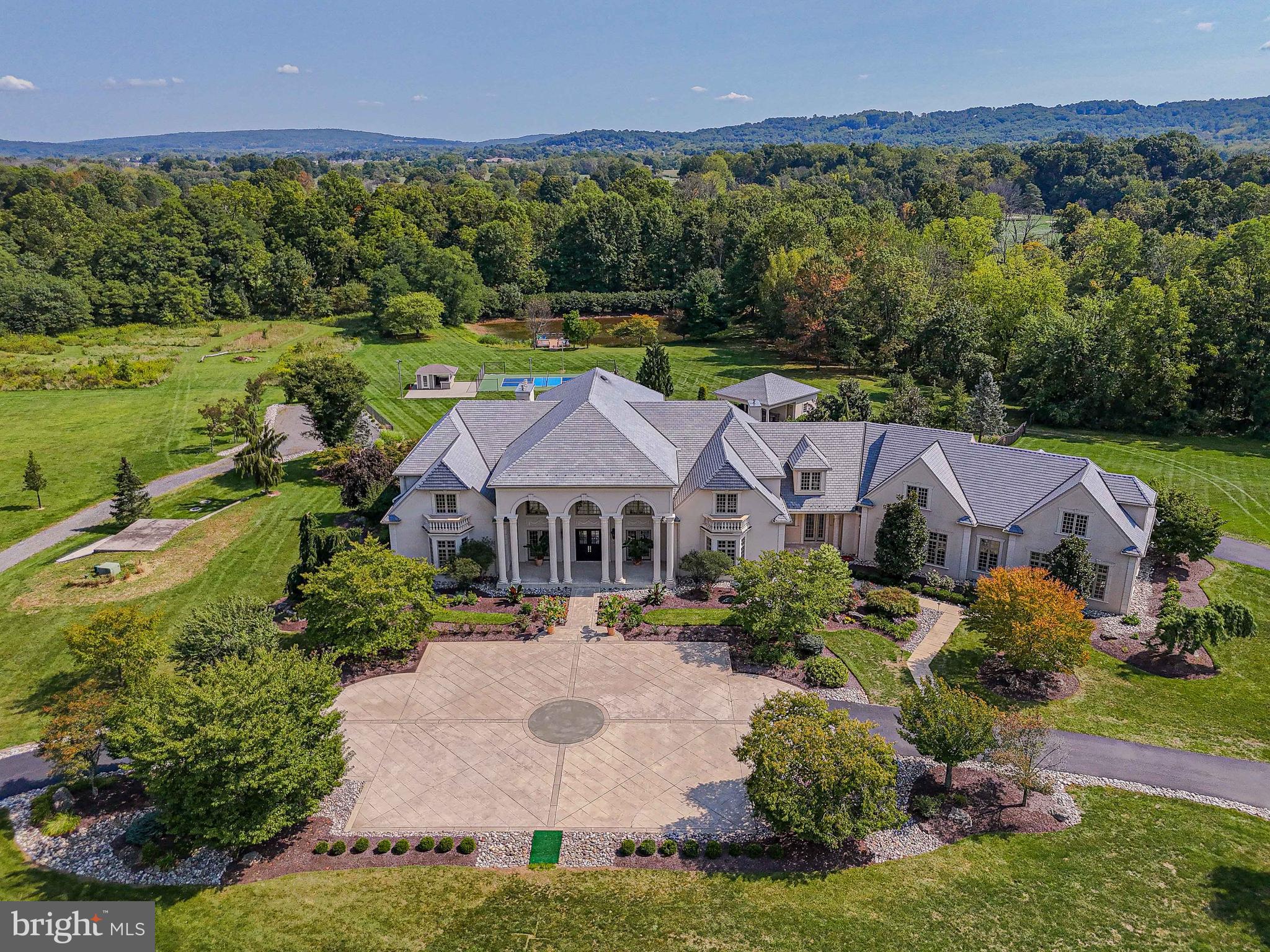 an aerial view of a house with garden