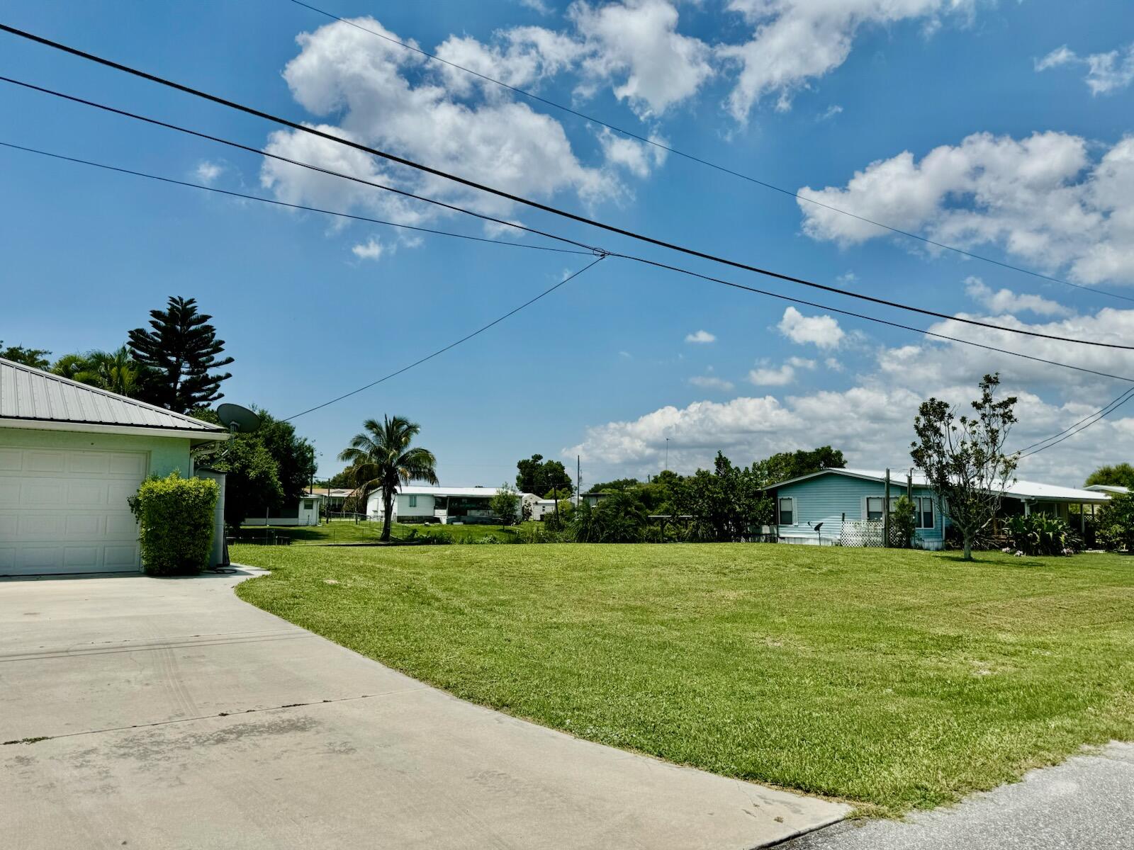 a view of a fountain in front of a house