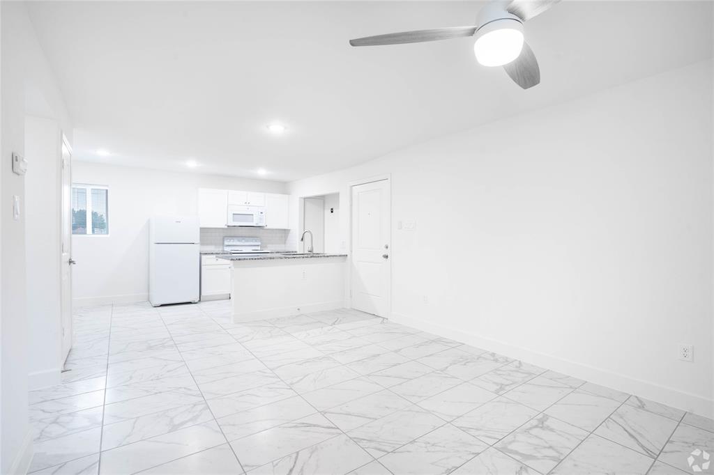 a view of a kitchen with a sink