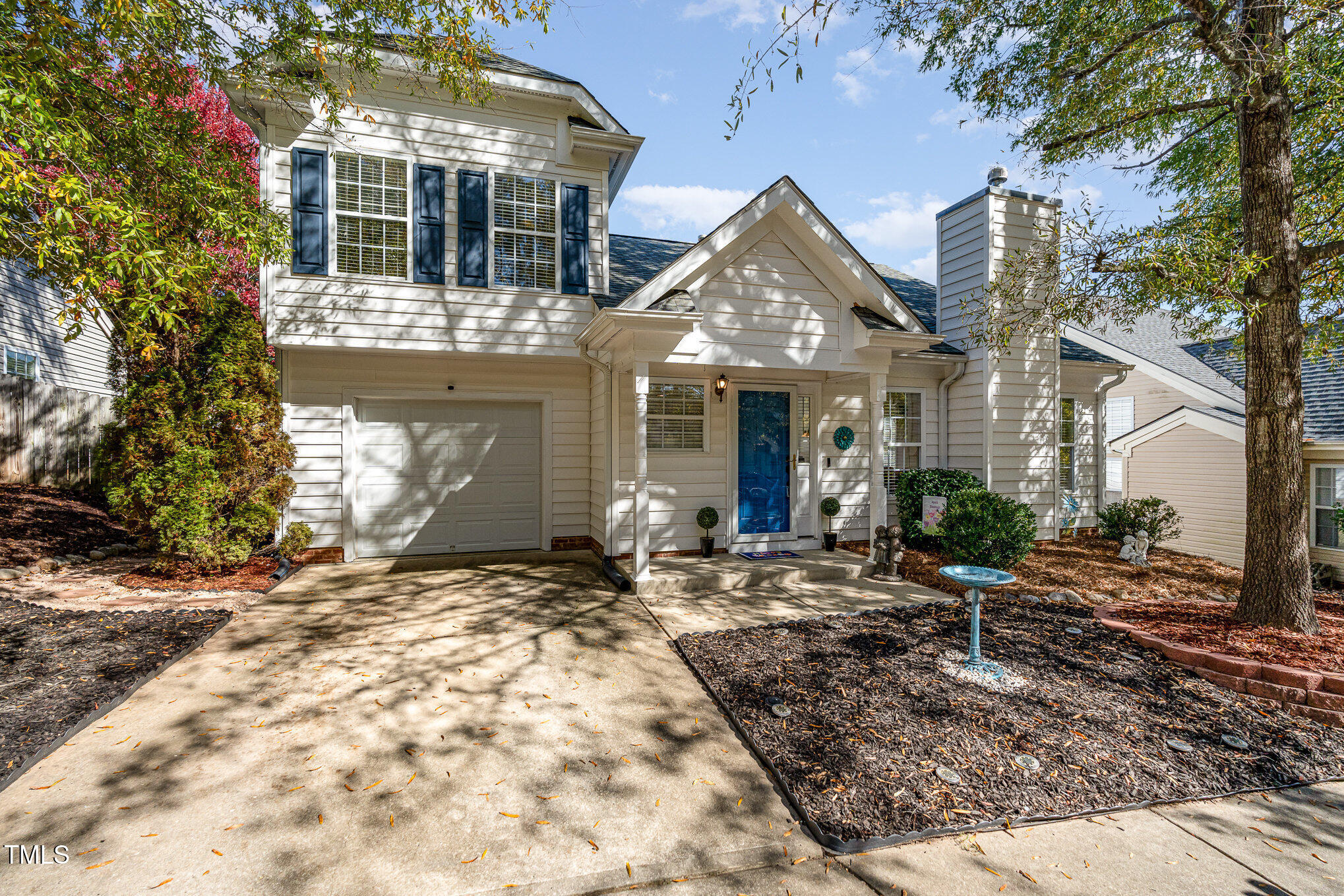 a front view of a house with yard