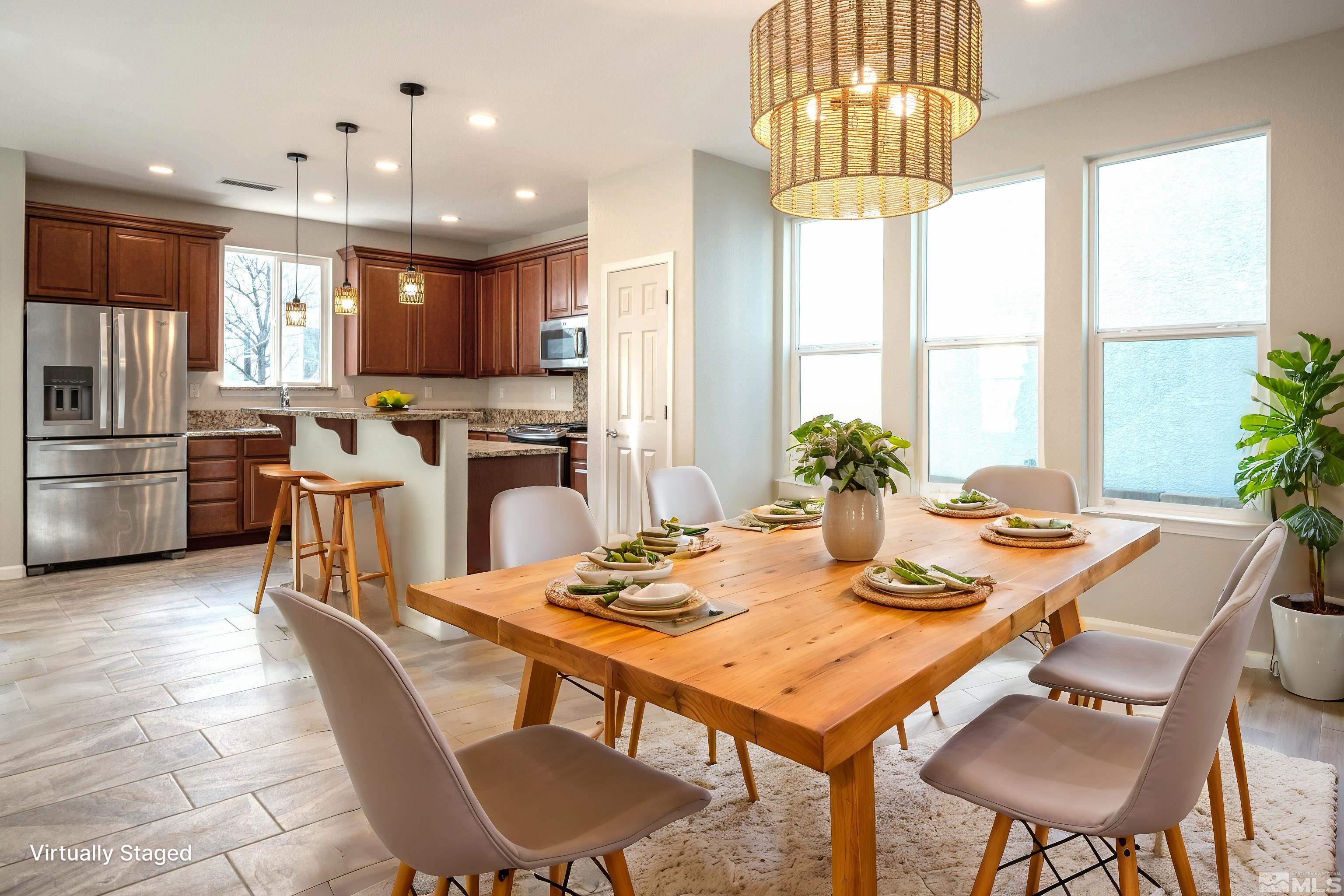 a view of a dining room with furniture window and outside view