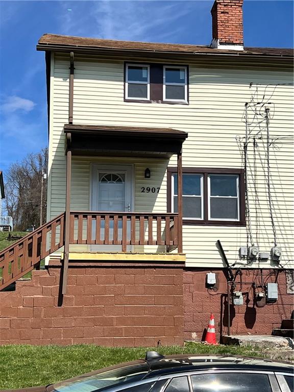 a view of house with outdoor space