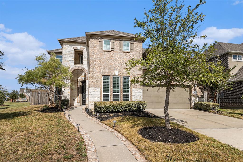 a front view of a house with entertaining space