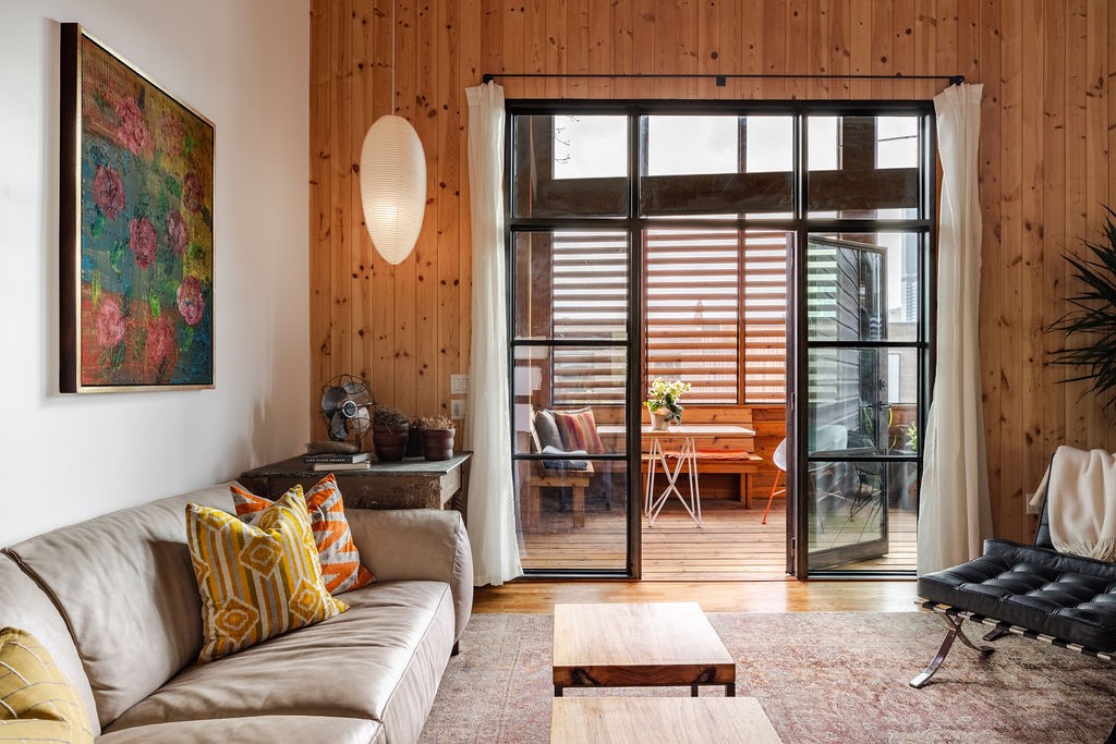 living room opens to huge front screened porch