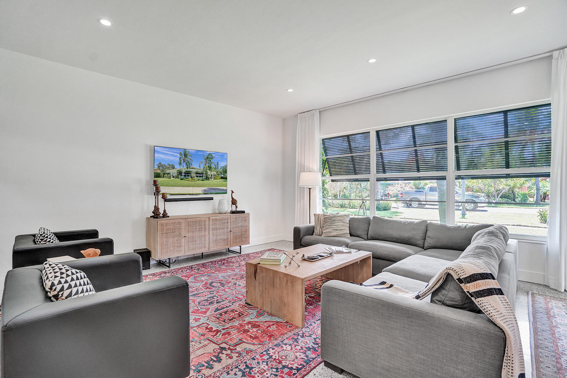 a living room with furniture and a window