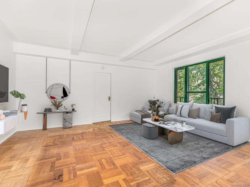 a living room with furniture and window