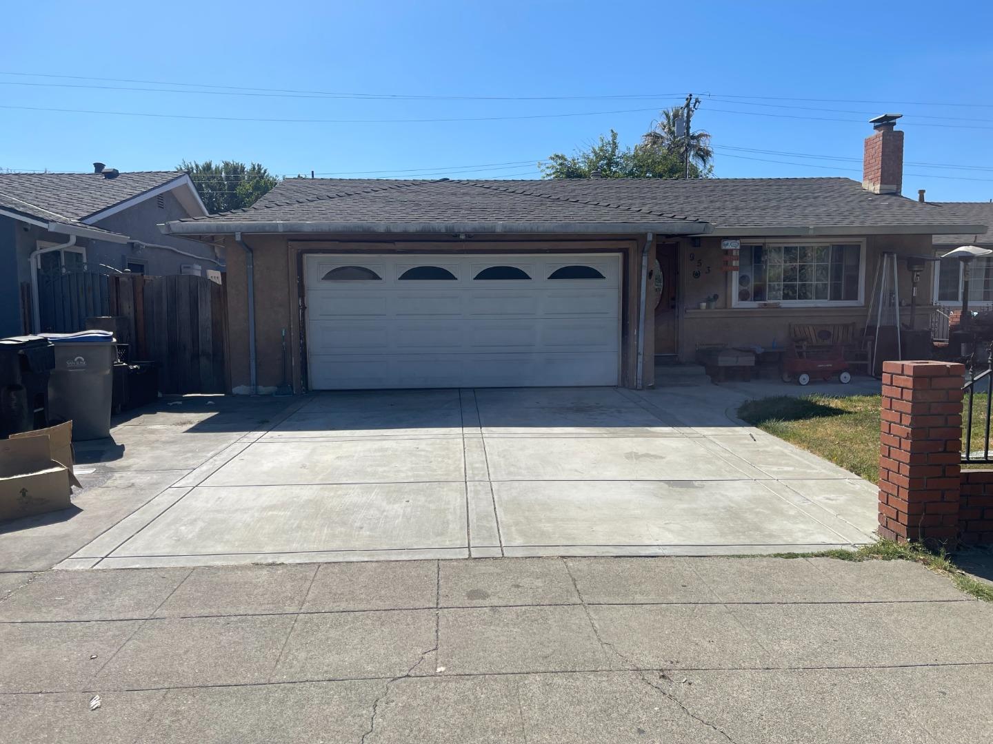 a front view of a house with a garage