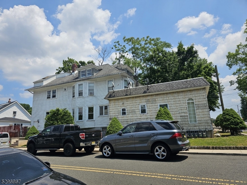 a car parked in front of a house