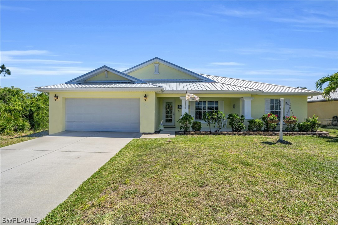 front view of a house with a yard