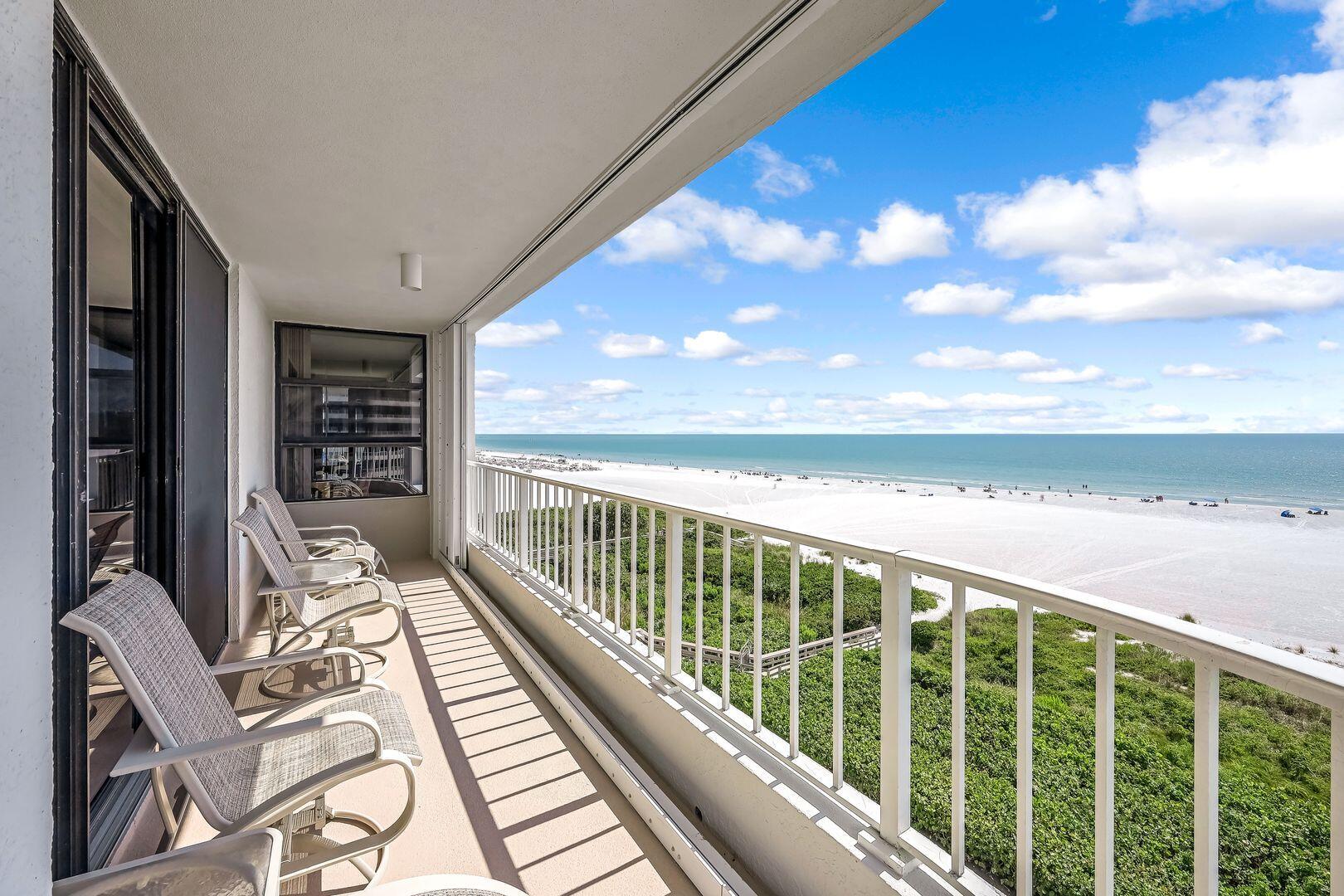 a view of balcony with furniture