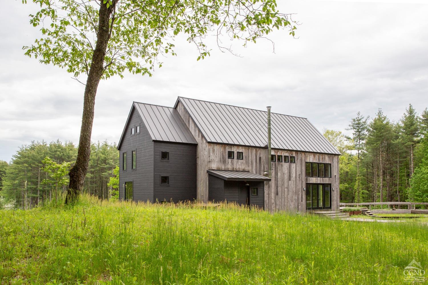 a house view with a garden space