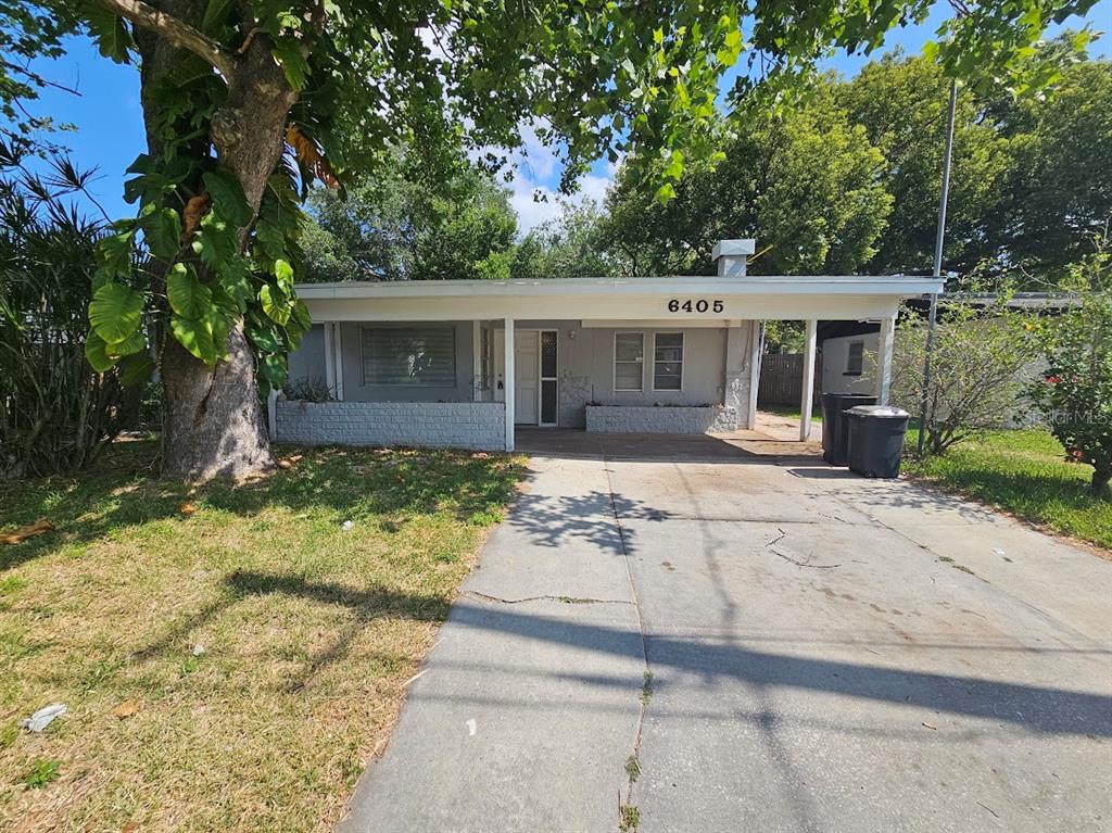 front view of a house with a yard