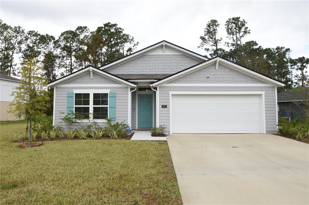 front view of house with a yard