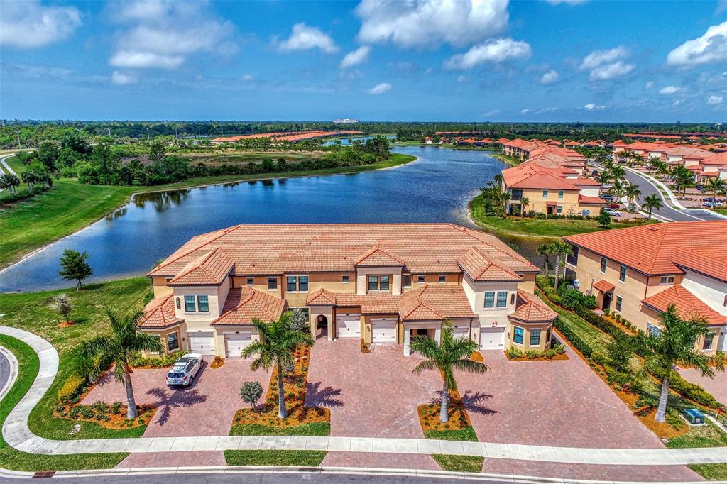 an aerial view of residential houses and outdoor space