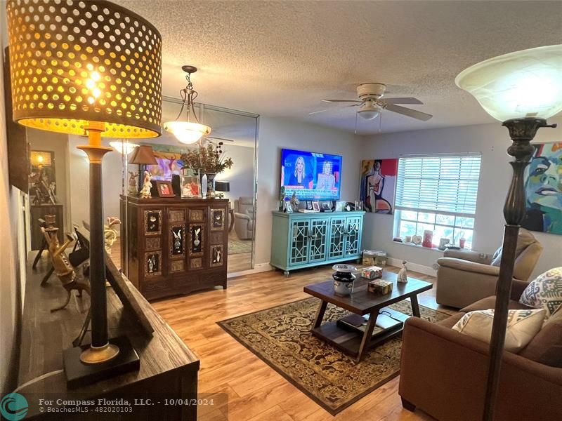 a living room filled with furniture and a table