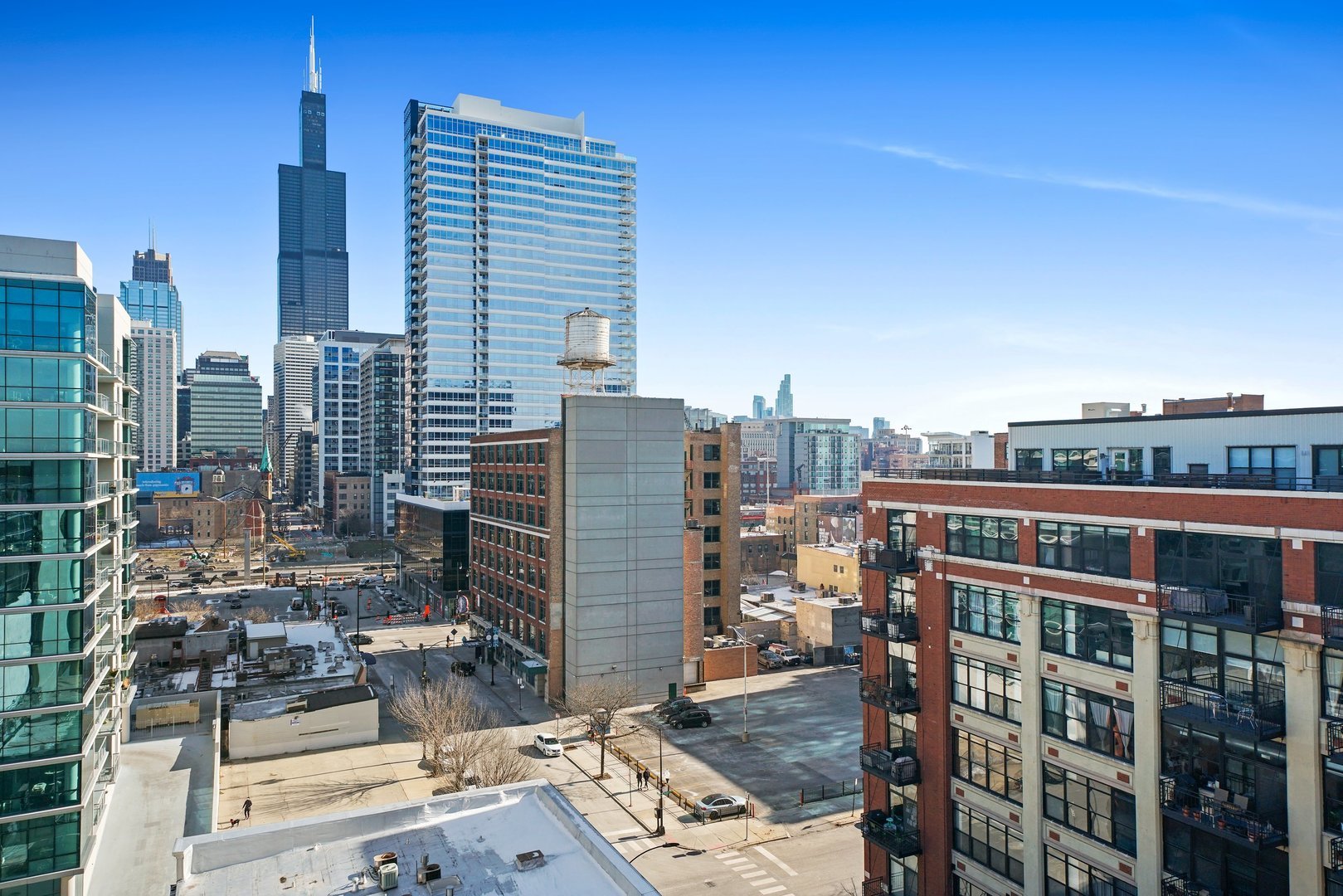 a view of a city with tall buildings