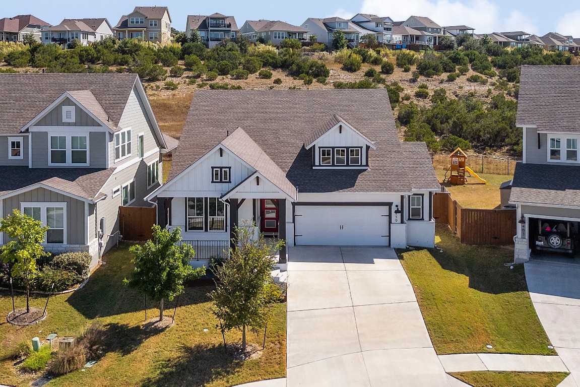 Experience idyllic greenbelt living in the highly coveted Headwaters community of Dripping Springs!