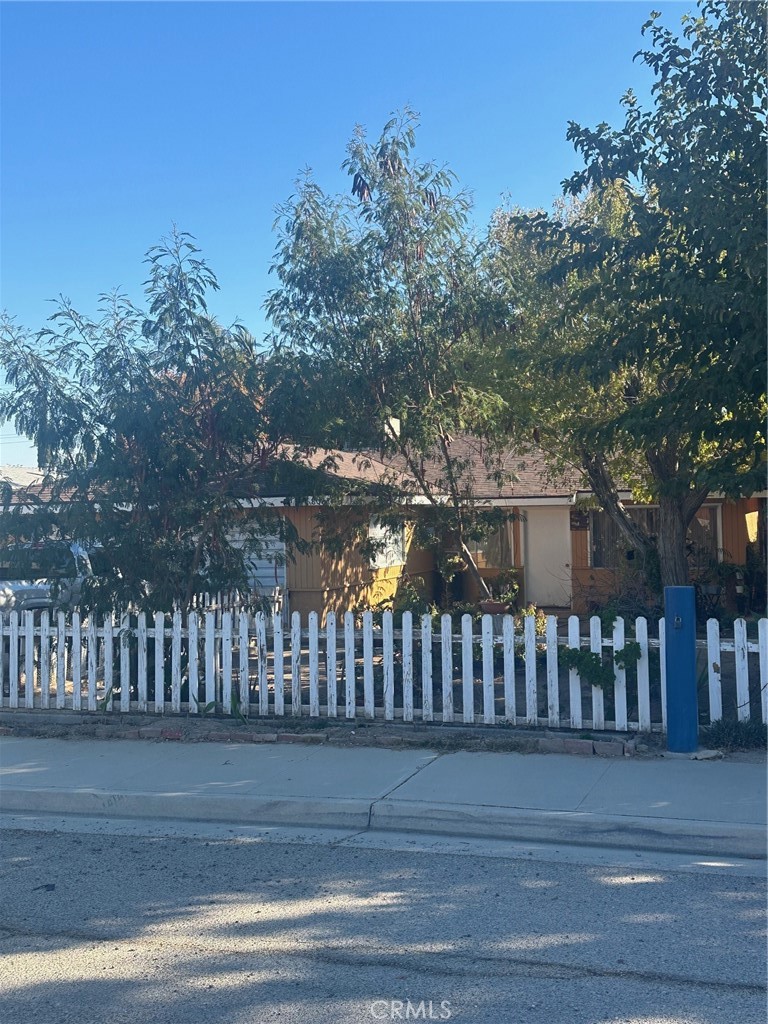 a view of a chair and yard