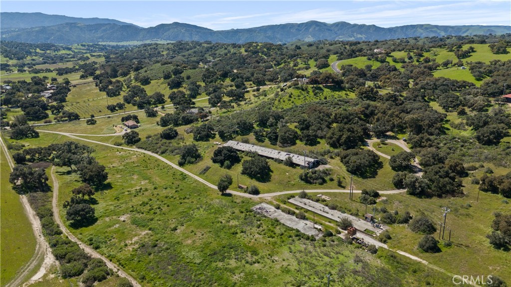 an aerial view of residential house with outdoor space