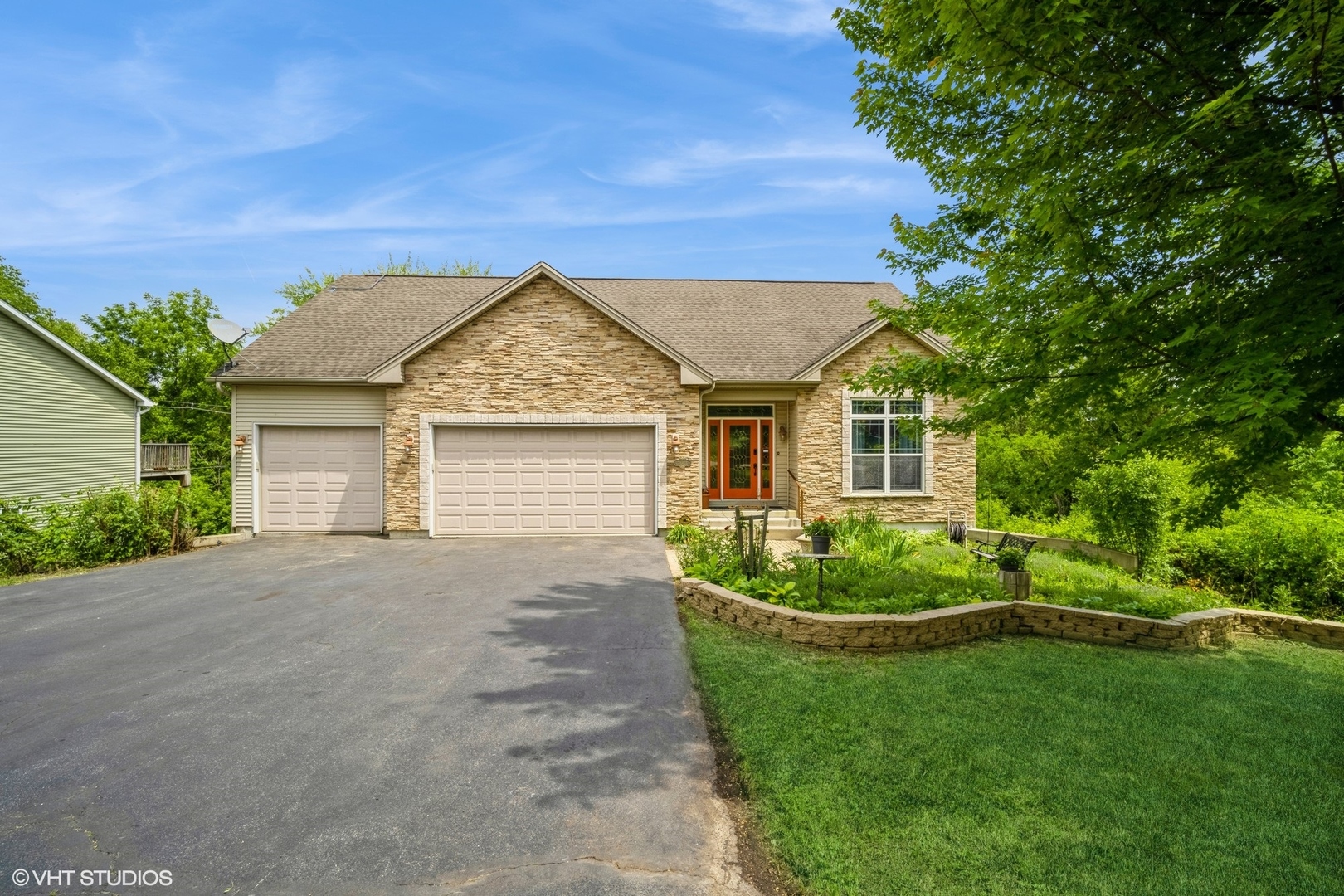 front view of a house with a yard