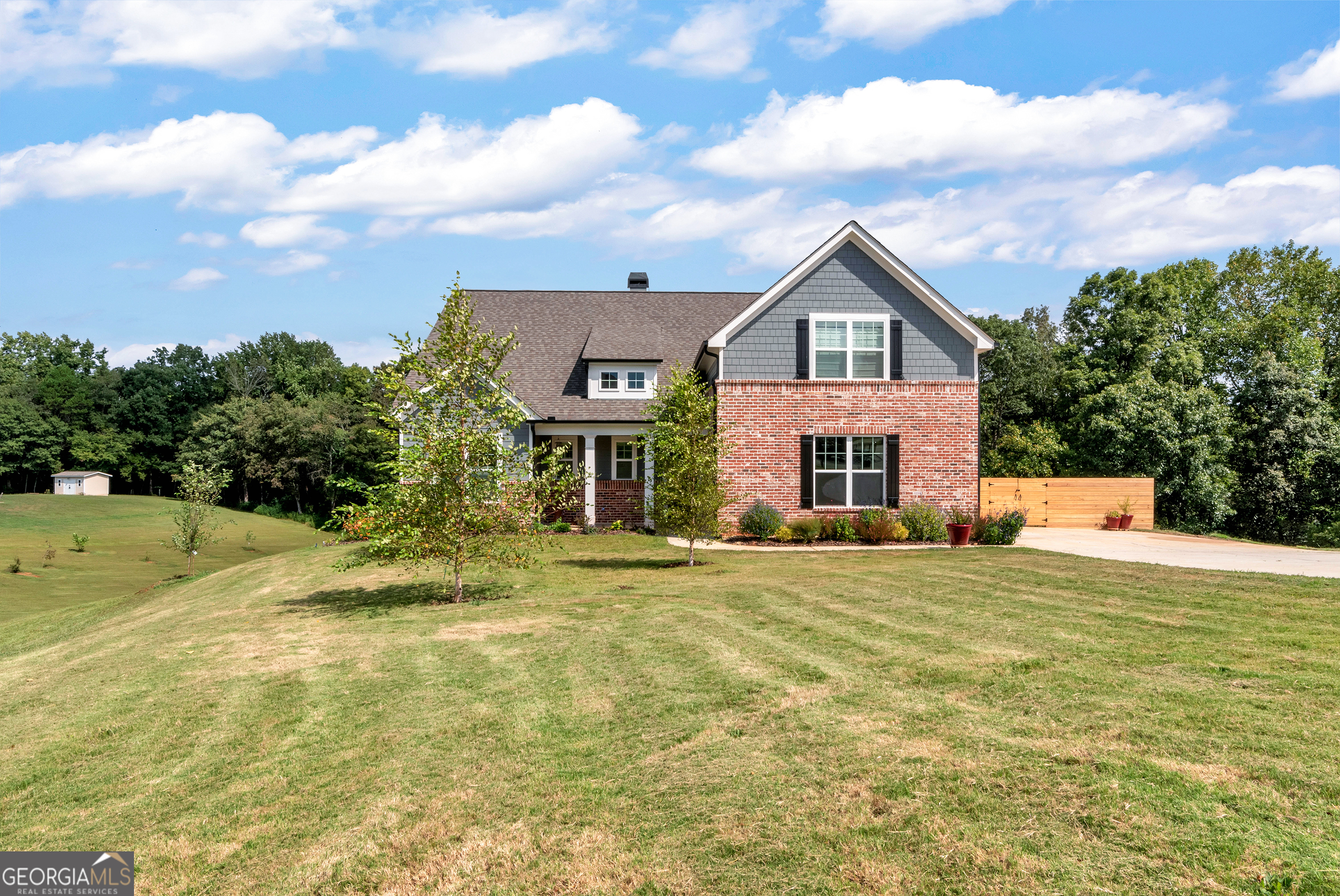 a house view with a garden space