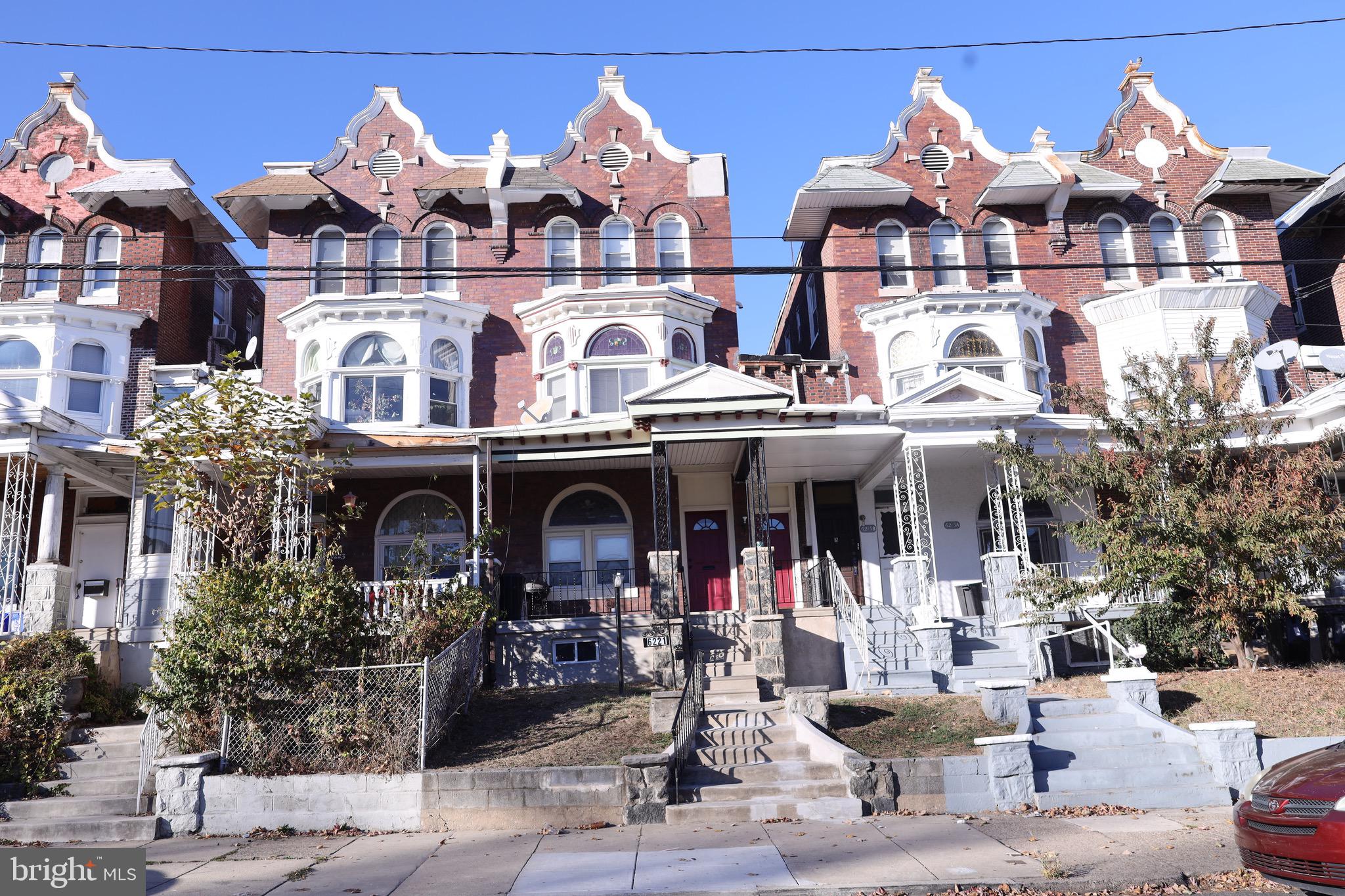 a front view of a building with street view