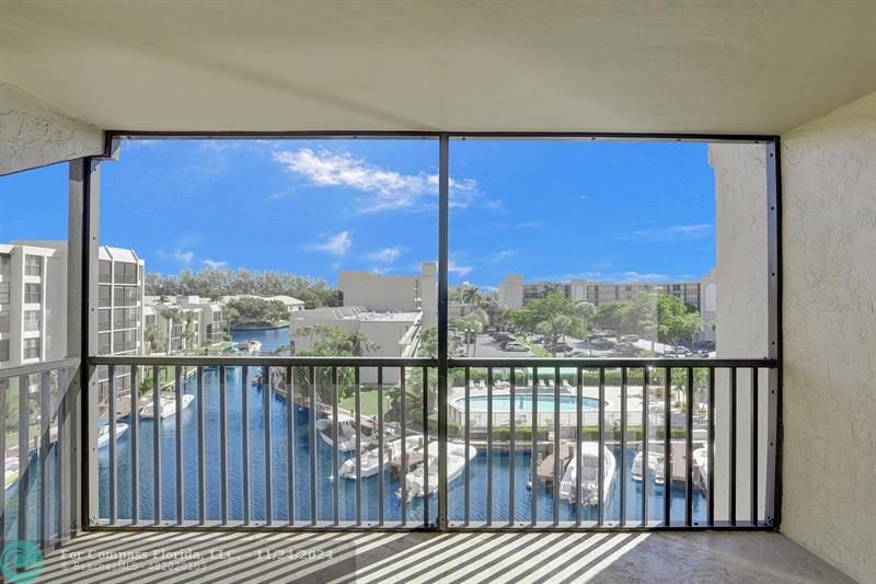 a view of a balcony with city view