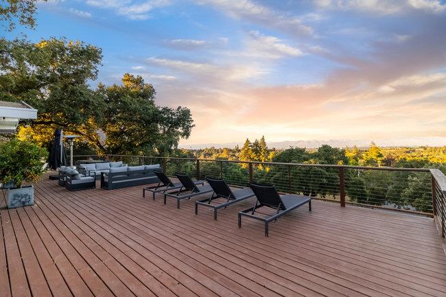 a view of a terrace with sitting area